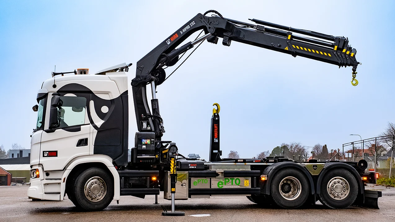 Loader crane operator safely handling a commercial load in Beckenham
